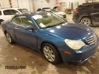2010 Chrysler Sebring Limited z VIN 1C3BC6EV4AN122733, wystawiony jako IAAI lot #41420349 z przebiegiem 128 164 mil mil oraz . Historia ofert i sprzedaży dostępna na DreamBid. Obrazek 1.