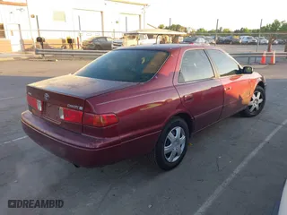 2000 Toyota Camry CE with VIN 4T1BG22K9YU688451, listed as a IAAI auction lot 42066777 with 210,221 mi miles. Bid and sale history available at carsss.com. Image 4.