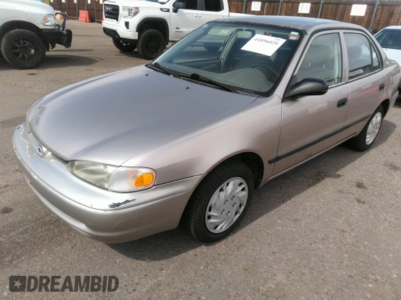 1998 Chevrolet Prizm Lsi z VIN 1Y1SK5285WZ438757, wystawiony jako IAAI lot #41896020 z przebiegiem 106 369 mil mil oraz . Historia ofert i sprzedaży dostępna na DreamBid. Obrazek 6.