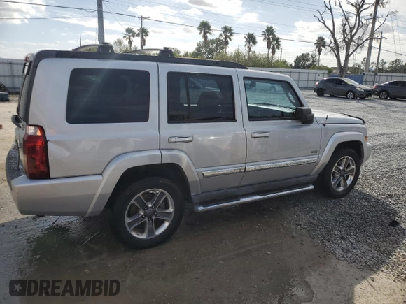 2006 Jeep Commander with VIN 1J8HH48K96C289162, listed as a Copart auction lot 80979074 with 170,581 mi miles and Salvage title. Bid and sale history available at DreamBid. Image 3.