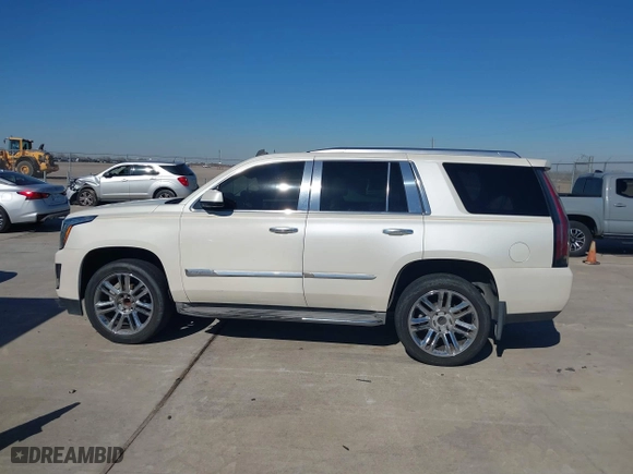 2015 Cadillac Escalade Luxury with VIN 1GYS3BKJ7FR303390, listed as a IAAI auction lot 41428556 with 152,978 mi miles. Bid and sale history available at carsss.com. Image 14.