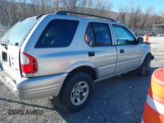 2001 Isuzu Rodeo S with VIN 4S2DM58W414351245, listed as a IAAI auction lot 41339632 with 149,543 mi miles and . Bid and sale history available at DreamBid. Image 4.