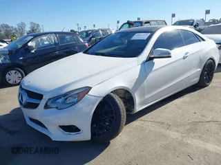 2014 Mercedes-Benz E-Class E 350 with VIN WDDKJ5KB0EF253962, listed as a IAAI auction lot 41013329 with 75,731 mi miles. Bid and sale history available at carsss.com. Image 2.