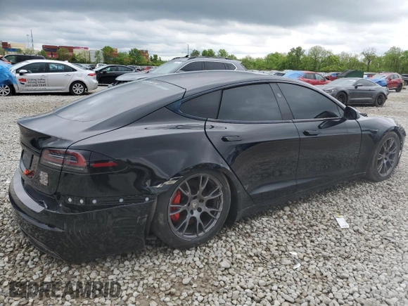 2023 Tesla Model S Plaid with VIN 5YJSA1E67PF511354, listed as a Copart auction lot 56648975 with 69,002 mi miles and Salvage title. Bid and sale history available at DreamBid. Image 3.