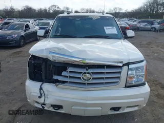 2005 Cadillac Escalade z VIN 1GYEC63T55R115387, wystawiony jako IAAI lot #41791855 z przebiegiem 165 246 mil mil oraz . Historia ofert i sprzedaży dostępna na DreamBid. Obrazek 13.