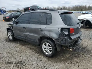 2016 Volkswagen Tiguan S with VIN WVGBV7AX4GW593475, listed as a Copart auction lot 52433155 with 140,356 mi miles and Salvage Title. Bid and sale history available at DreamBid. Image 2.
