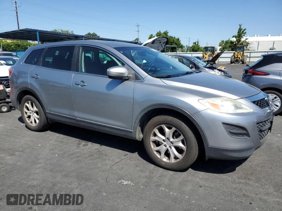 2012 Mazda CX-9 Touring z VIN JM3TB3CV5C0352857, wystawiony jako Copart lot #57531225 z przebiegiem 178 877 mil mil oraz Czysty tytuł • Clean title. Historia ofert i sprzedaży dostępna na DreamBid. Obrazek 4.
