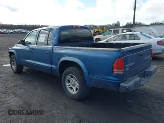 2004 Dodge Dakota Sport with VIN 1D7HL38K84S573410, listed as a IAAI auction lot 41495481 with 218,866 mi miles. Bid and sale history available at carsss.com. Image 3.