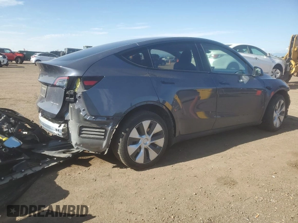 2023 Tesla Model Y Long Range z VIN 7SAYGDEE7PF965446, wystawiony jako Copart lot #54710375 z przebiegiem 23 807 mil mil oraz Szkoda całkowita • Salvage title. Historia ofert i sprzedaży dostępna na DreamBid. Obrazek 3.