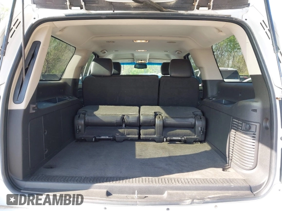 2013 Chevrolet Suburban LT with VIN 1GNSKJE75DR174167, listed as a IAAI auction lot 42005614 with 290,223 mi miles and . Bid and sale history available at DreamBid. Image 19.