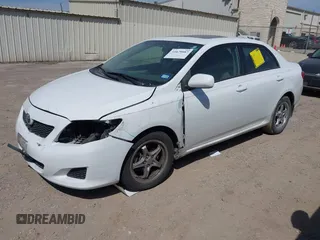 2009 Toyota Corolla with VIN 2T1BU40E19C143137, listed as a IAAI auction lot 41679087 with 155,160 mi miles. Bid and sale history available at carsss.com. Image 2.