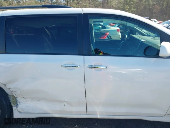 2015 Toyota Sienna SE with VIN 5TDXK3DC4FS658148, listed as a IAAI auction lot 41601341 with 110,329 mi miles. Bid and sale history available at carsss.com. Image 13.