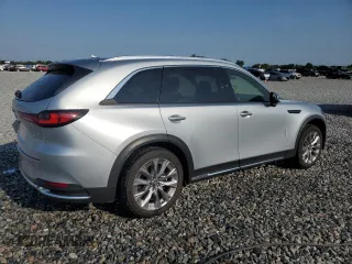 2024 Mazda CX-90 Premium z VIN JM3KKDHDXR1165117, wystawiony jako Copart lot #58350355 z przebiegiem 30 695 mil mil oraz Czysty tytuł • Clean title. Historia ofert i sprzedaży dostępna na DreamBid. Obrazek 3.