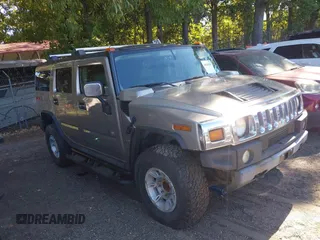 2003 Hummer H2 with VIN 5GRGN23U73H126287, listed as a IAAI auction lot 40626589 with 1 mi miles. Bid and sale history available at carsss.com. Image 1.