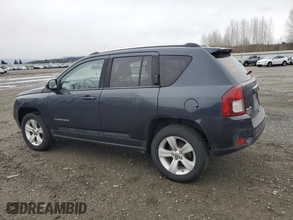 2014 Jeep Compass Latitude with VIN 1C4NJDEB4ED601769, listed as a Copart auction lot 48901365 with 129,826 mi miles and Salvage Title. Bid and sale history available at carsss.com. Image 2.