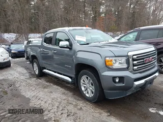 2018 GMC Canyon 4WD SLT with VIN 1GTG6DEN2J1301633, listed as a IAAI auction lot 41530624 with 98,771 mi miles. Bid and sale history available at carsss.com. Image 1.