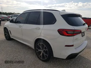 2020 BMW X5 sDrive40i with VIN 5UXCR4C02LLW63576, listed as a Copart auction lot 71912802 with 27,686 mi miles. Bid and sale history available at carsss.com. Image 2.