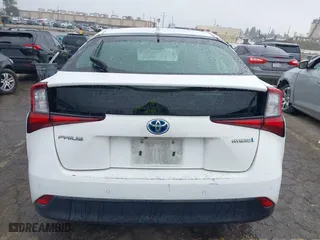 2021 Toyota Prius L Eco with VIN JTDKAMFU6M3141019, listed as a IAAI auction lot 41821212 with 202,756 mi miles. Bid and sale history available at carsss.com. Image 16.