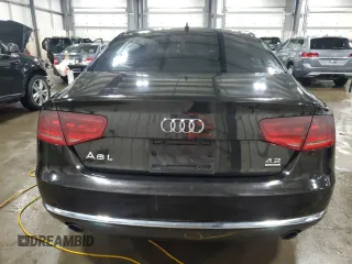 2011 Audi A8 z VIN WAURVAFD8BN005569, wystawiony jako Copart lot #52101065 z przebiegiem 104 893 mil mil oraz Szkody całkowita. Historia ofert i sprzedaży dostępna na DreamBid. Obrazek 6.