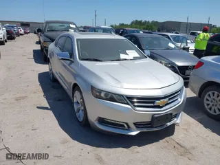 2014 Chevrolet Impala LTZ with VIN 1G1155S31EU158639, listed as a IAAI auction lot 41971523 with 222,414 mi miles. Bid and sale history available at carsss.com. Image 1.
