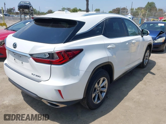 2019 Lexus RX 350 with VIN 2T2ZZMCA9KC148516, listed as a IAAI auction lot 42117972 with 57,224 mi miles and . Bid and sale history available at DreamBid. Image 4.