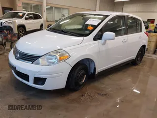 2009 Nissan Versa 1.8 S with VIN 3N1BC13E69L386083, listed as a IAAI auction lot 41717999 with 99,511 mi miles. Bid and sale history available at carsss.com. Image 2.