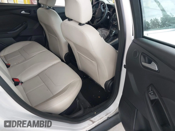 2018 Ford Focus Titanium z VIN 1FADP3N27JL314856, wystawiony jako IAAI lot #42553390 z przebiegiem 82 936 mil mil oraz . Historia ofert i sprzedaży dostępna na DreamBid. Obrazek 8.