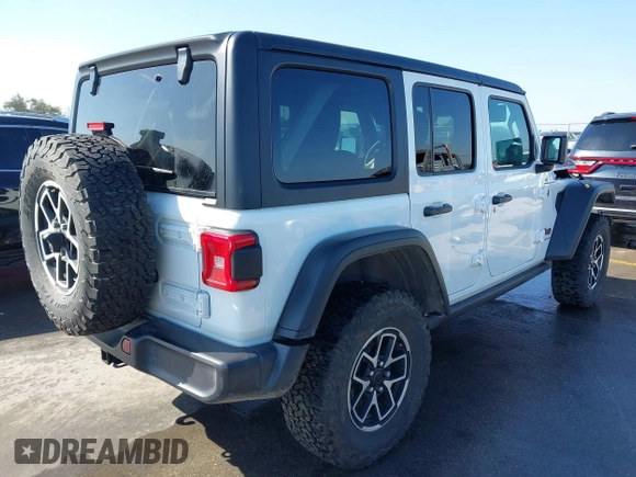 2024 Jeep Wrangler Rubicon with VIN 1C4PJXFG6RW291185, listed as a IAAI auction lot 41773050 with 12,400 mi miles and . Bid and sale history available at DreamBid. Image 4.
