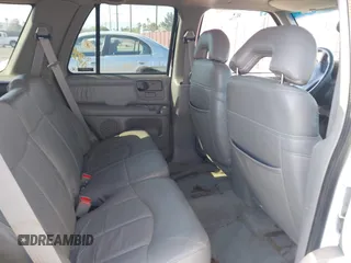 1996 GMC Jimmy SL with VIN 1GKDT13W4T2546327, listed as a IAAI auction lot 41966572 with 134,749 mi miles. Bid and sale history available at carsss.com. Image 8.