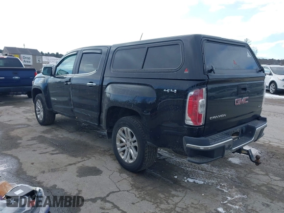2015 GMC Canyon 4WD SLT with VIN 1GTG6CE39F1238269, listed as a IAAI auction lot 41327897 with 155,663 mi miles. Bid and sale history available at carsss.com. Image 3.