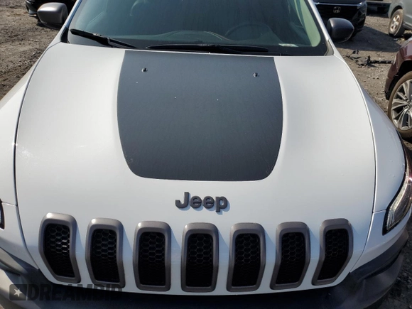 2015 Jeep Cherokee Trailhawk z VIN 1C4PJMBS6FW558653, wystawiony jako Copart lot #51066195 z przebiegiem 32 905 mil mil oraz Szkoda całkowita • Salvage title. Historia ofert i sprzedaży dostępna na DreamBid. Obrazek 12.