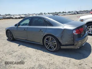 2013 Audi S8 with VIN WAUD2AFD7DN027777, listed as a Copart auction lot 62482694 with 128,383 mi miles and Salvage Title. Bid and sale history available at carsss.com. Image 2.