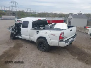 2013 Toyota Tacoma z VIN 5TFMU4FN9DX019465, wystawiony jako IAAI lot #42010194 z przebiegiem 115 812 mil mil oraz . Historia ofert i sprzedaży dostępna na DreamBid. Obrazek 3.