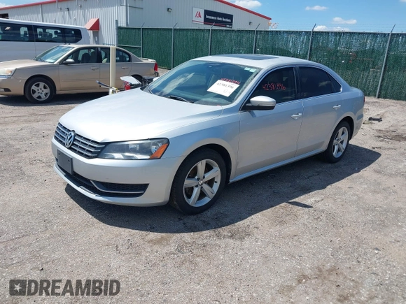 2013 Volkswagen Passat SE with VIN 1VWBN7A3XDC072918, listed as a IAAI auction lot 42381396 with 180,103 mi miles and . Bid and sale history available at DreamBid. Image 2.