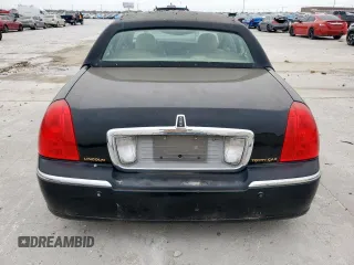 2004 Lincoln Town Car Ultimate z VIN 1LNHM83W14Y660640, wystawiony jako Copart lot #53652685 z przebiegiem 147 781 mil mil oraz Czysty tytuł • Clean title. Historia ofert i sprzedaży dostępna na DreamBid. Obrazek 6.