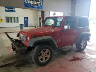 2008 Jeep Wrangler X z VIN 1J4FA24158L560025, wystawiony jako Copart lot #60615495 z przebiegiem 201 249 mil mil oraz Czysty tytuł • Clean title. Historia ofert i sprzedaży dostępna na DreamBid. Obrazek 1.
