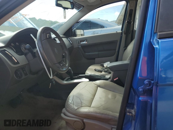 2010 Ford Focus SEL with VIN 1FAHP3HN8AW159109, listed as a Copart auction lot 68956493 with 216,237 mi miles and Salvage Title. Bid and sale history available at carsss.com. Image 7.
