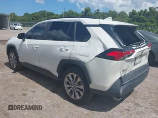 2021 Toyota RAV4 XLE Premium with VIN 2T3C1RFV0MW107651, listed as a IAAI auction lot 42558254 with 68,286 mi miles and . Bid and sale history available at DreamBid. Image 3.