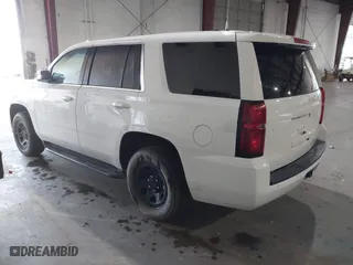 2020 Chevrolet Tahoe Commercial with VIN 1GNLCDEC8LR283902, listed as a IAAI auction lot 41670895 with 91,508 mi miles. Bid and sale history available at carsss.com. Image 3.
