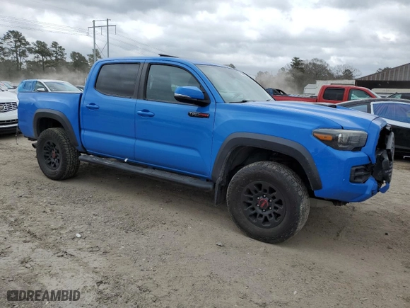 2019 Toyota Tacoma 4WD SR with VIN 5TFCZ5AN1KX185793, listed as a Copart auction lot 47190905 with 129,430 mi miles and Salvage Title. Bid and sale history available at carsss.com. Image 4.