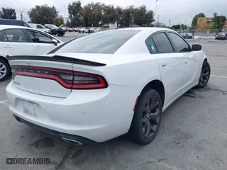 2018 Dodge Charger SXT with VIN 2C3CDXBG5JH114288, listed as a IAAI auction lot 41904768 with 139,638 mi miles. Bid and sale history available at carsss.com. Image 4.
