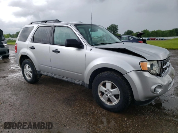 2010 Ford Escape XLS with VIN 1FMCU9C78AKD21851, listed as a Copart auction lot 61444945 with 70,404 mi miles and Clean title. Bid and sale history available at DreamBid. Image 4.