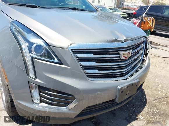 2018 Cadillac XT5 FWD with VIN 1GYKNARS5JZ242794, listed as a IAAI auction lot 42813475 with 32,266 mi miles and . Bid and sale history available at DreamBid. Image 16.