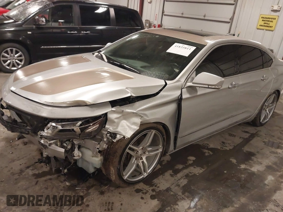 2015 Chevrolet Impala LT with VIN 2G1125S34F9277731, listed as a IAAI auction lot 41835811 with 102,628 mi miles and . Bid and sale history available at DreamBid. Image 2.