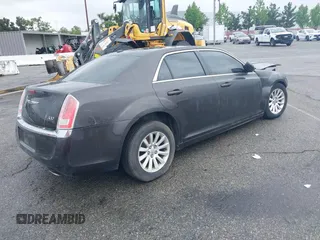 2012 Chrysler 300 with VIN 2C3CCAAG8CH183075, listed as a IAAI auction lot 40436578 with Not Provided miles and . Bid and sale history available at DreamBid. Image 4.
