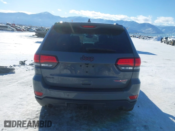 2021 Jeep Grand Cherokee Trailhawk with VIN 1C4RJFLG2MC854007, listed as a IAAI auction lot 41512394 with 50,674 mi miles. Bid and sale history available at carsss.com. Image 17.
