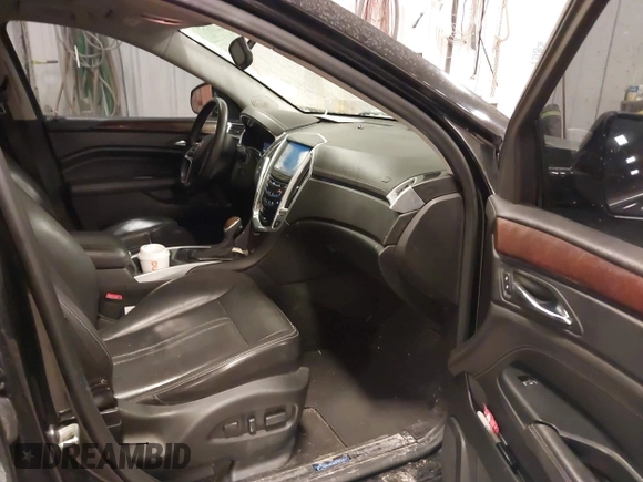 2014 Cadillac SRX Luxury Collection with VIN 3GYFNBE38ES518247, listed as a IAAI auction lot 41475294 with Not Provided miles and . Bid and sale history available at carsss.com. Image 5.