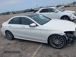 2016 Mercedes-Benz C 300 with VIN 55SWF4JB5GU131922, listed as a IAAI auction lot 42014152 with 52,041 mi miles and . Bid and sale history available at carsss.com. Image 14.