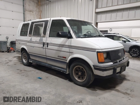 1994 Chevrolet Astro Cargo z VIN 1GBDM19Z0RB167297, wystawiony jako IAAI lot #42305621 z przebiegiem 154 683 mil mil oraz . Historia ofert i sprzedaży dostępna na DreamBid. Obrazek 1.