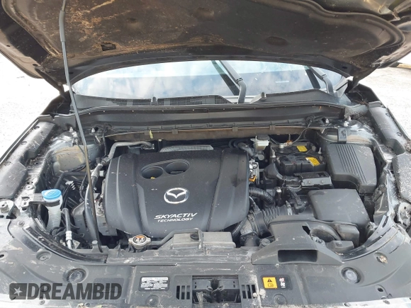 2019 Mazda CX-5 Touring with VIN JM3KFACM8K0694362, listed as a IAAI auction lot 41410185 with 89,443 mi miles. Bid and sale history available at carsss.com. Image 10.